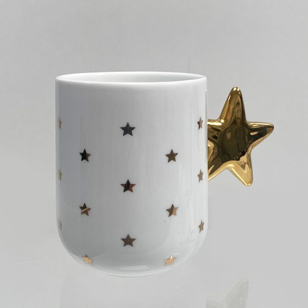 Alessi Delight Чашка с ручкой в форме звезды, размеры: 14,5х8,5х10h см, цвет - белый, золотой